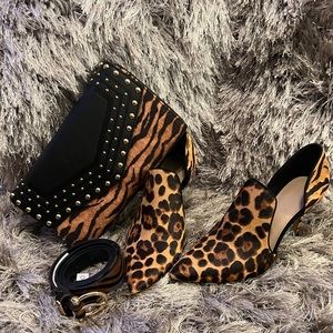 Animal print sit heels with the purse to match in belts